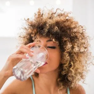 A woman drinking water